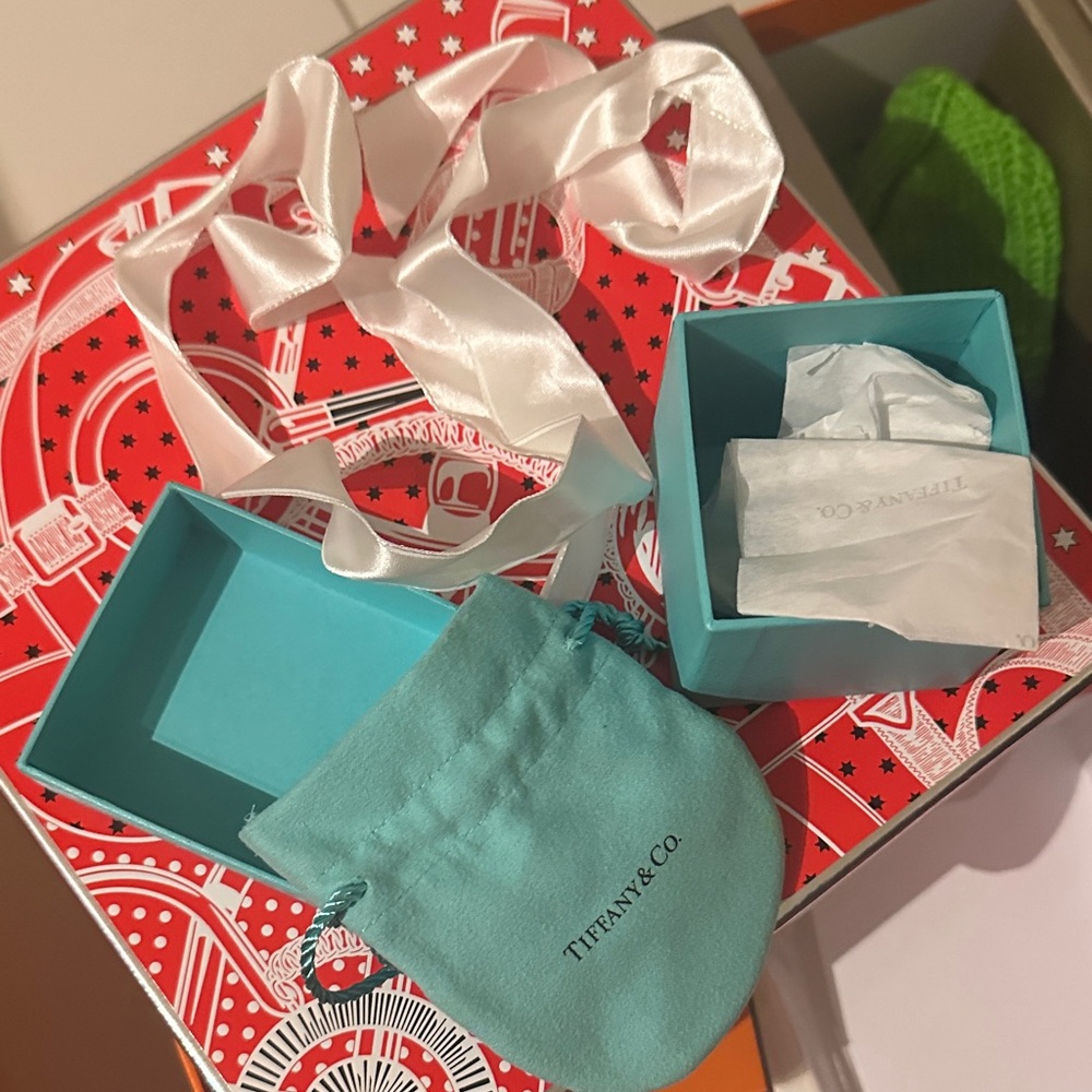 Tiffany & Co. Turquoise Box with White Ribbon